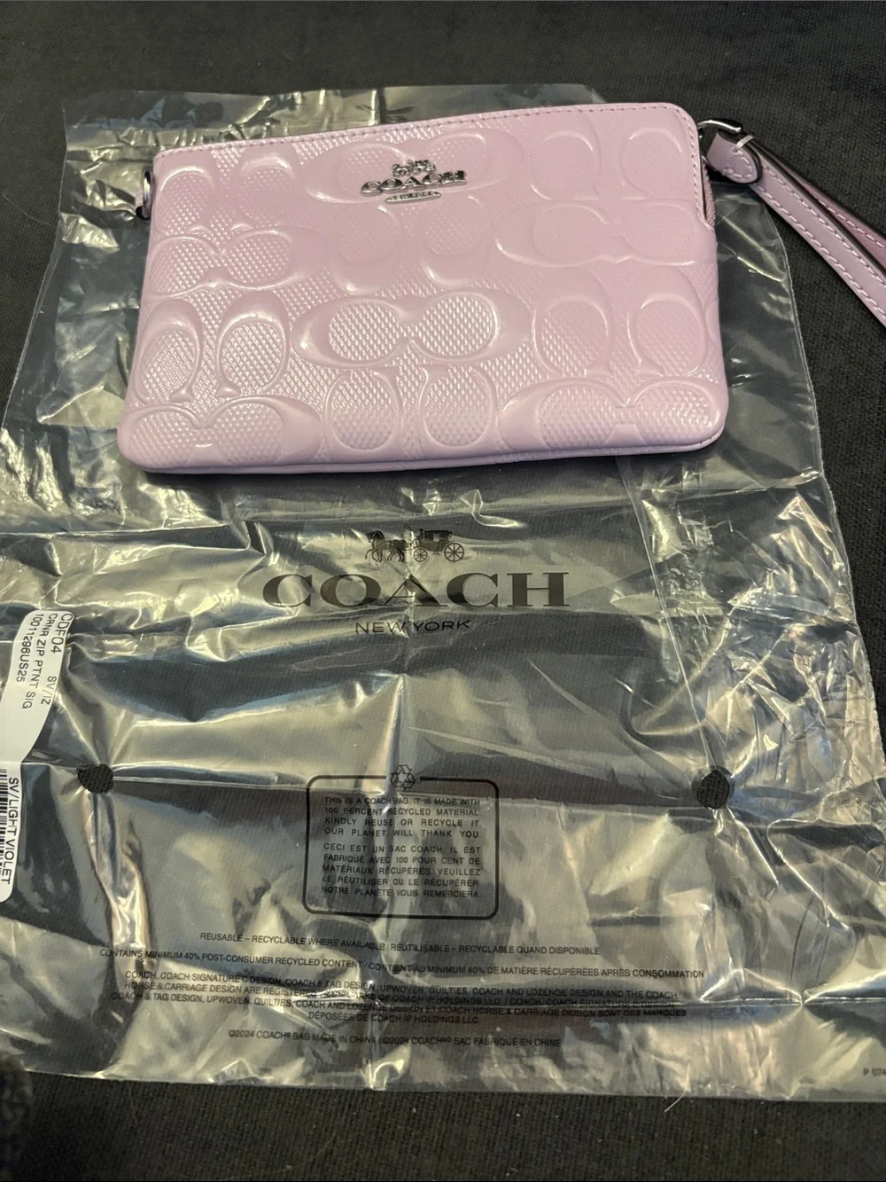 COACH Light Lilac Embossed Signature Wristlet